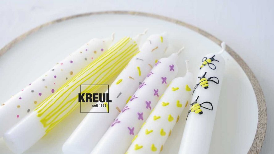 selbst bemalte Kerzen auf Teller - KREUL DIY Idee zum selber designen